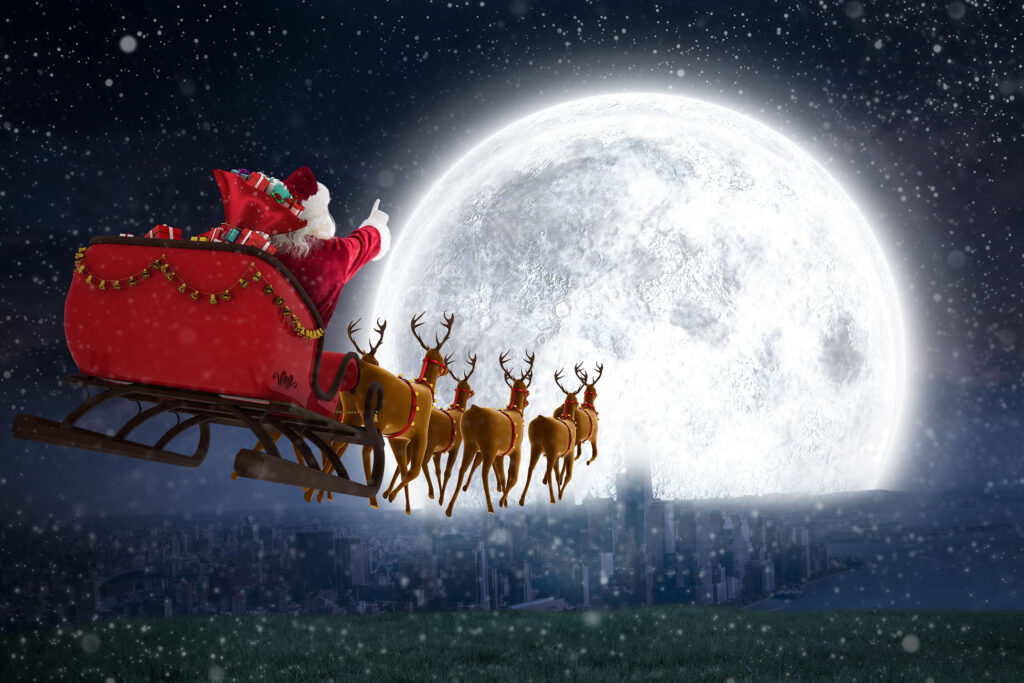 Composite Image Of Santa Claus Riding On Sleigh With Gift Box 005 2 green screen options